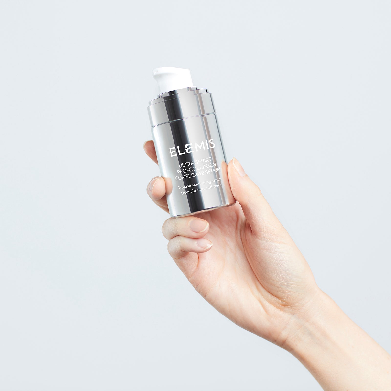 ELEMIS serum product held in hand